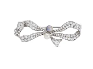 Antique Edwardian Diamond and Natural Pearl Bow Brooch in Platinum