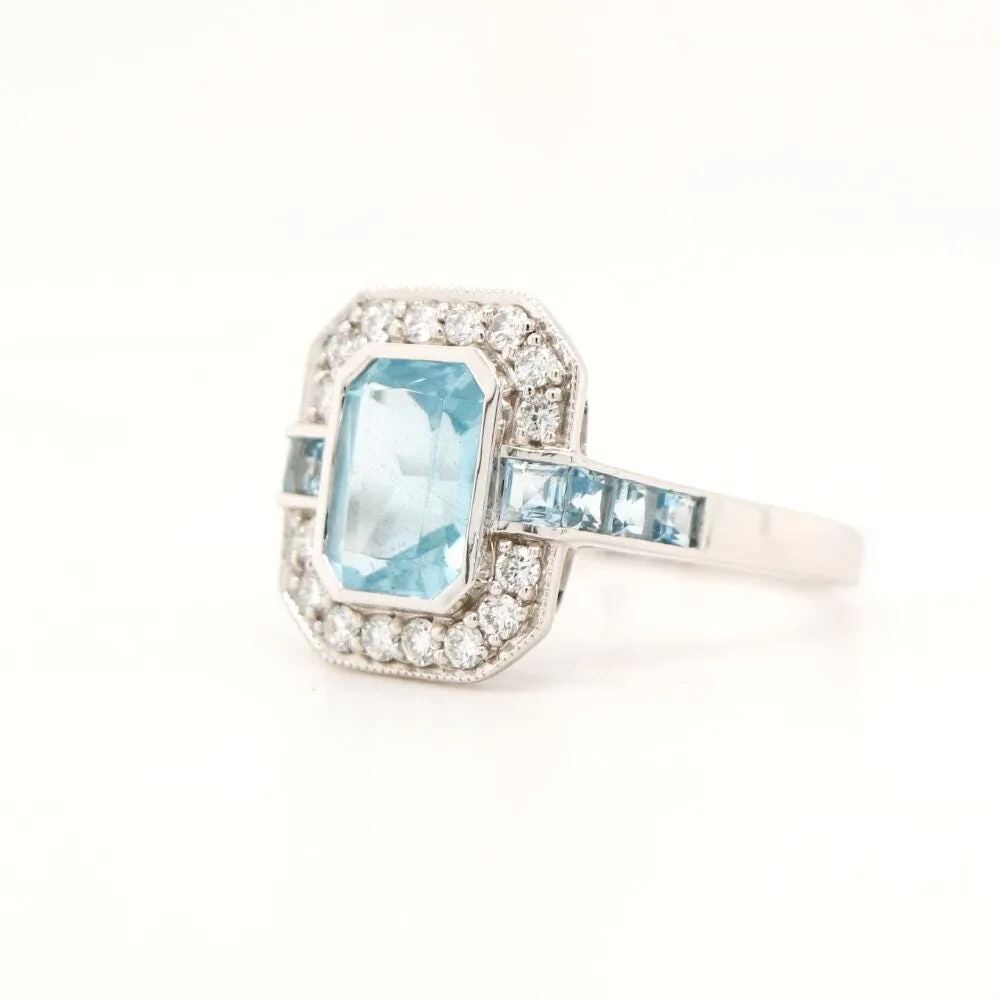 Aquamarine ring in Gold with Diamond Halo