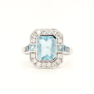 Aquamarine ring in Gold with Diamond Halo
